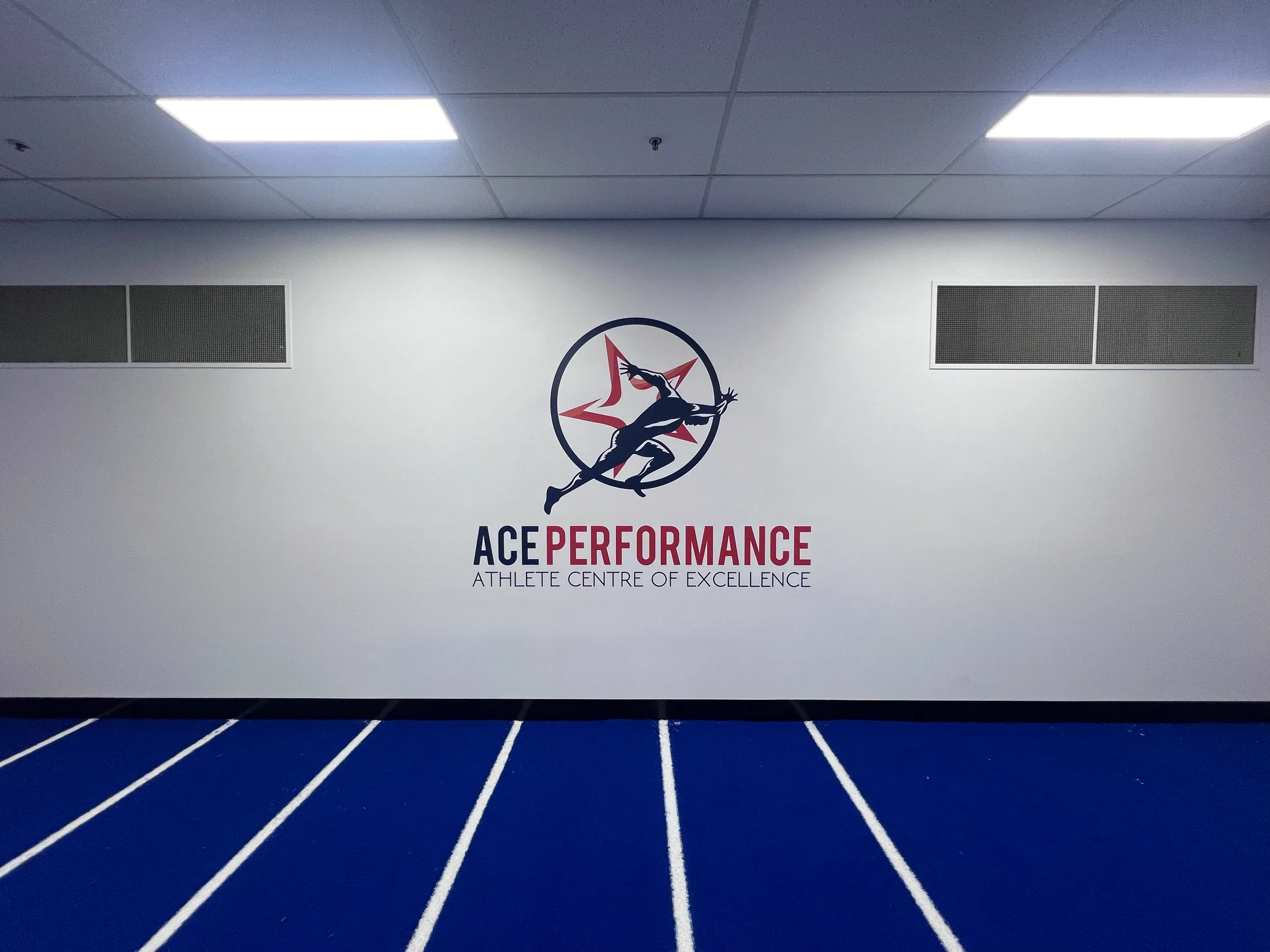 ACE Performance signage close to the building facade