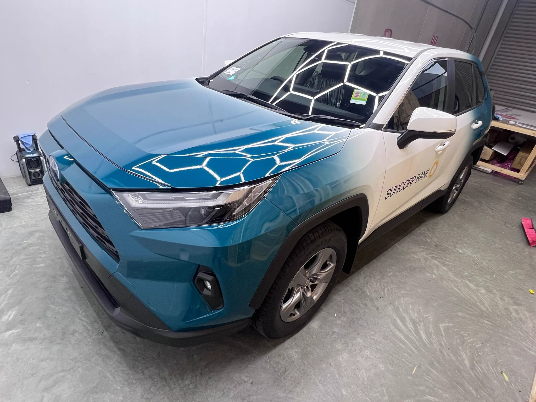 Blue colour-change SUV wrap