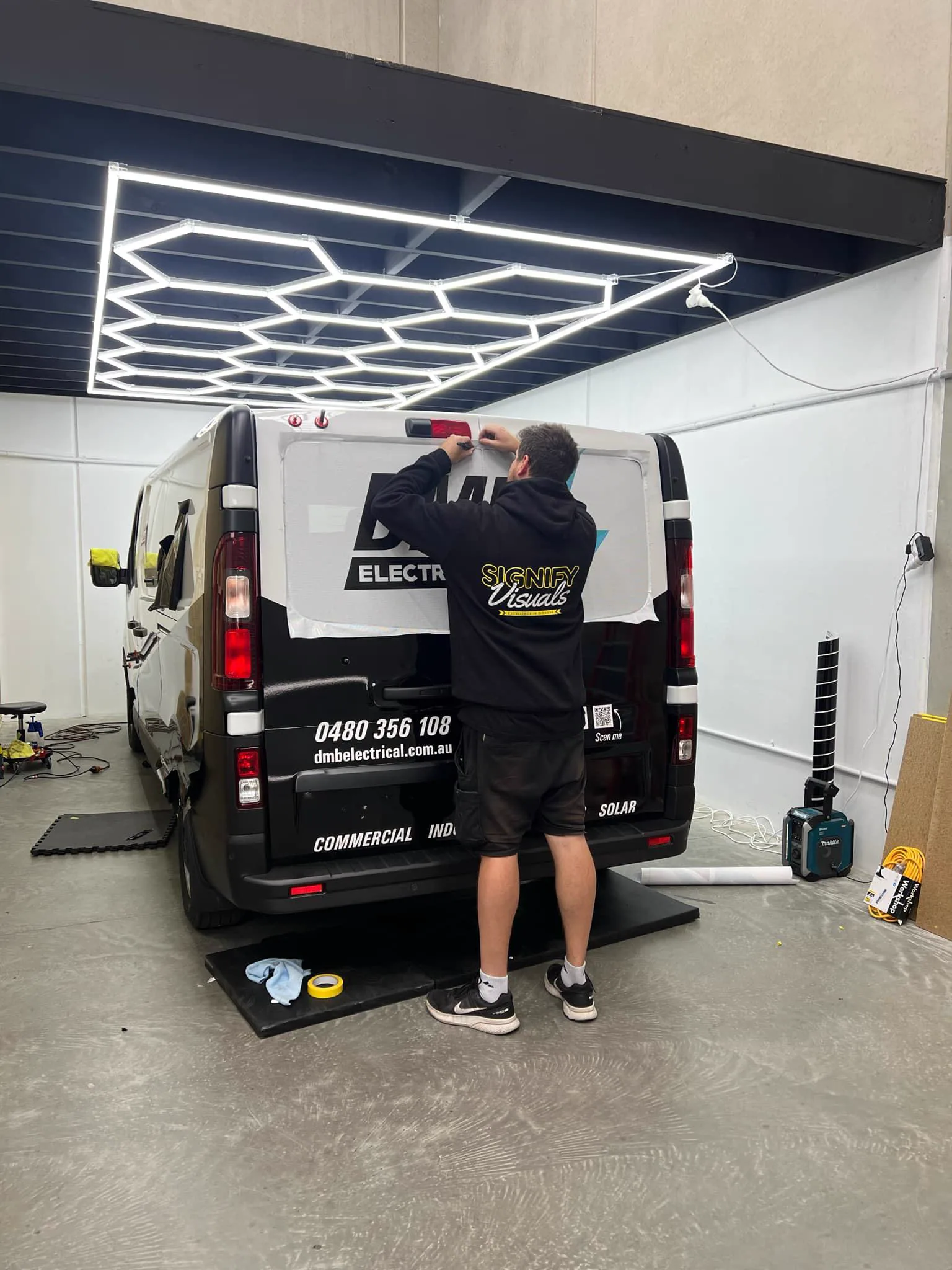 DMB Electrical fleet graphics installation detail