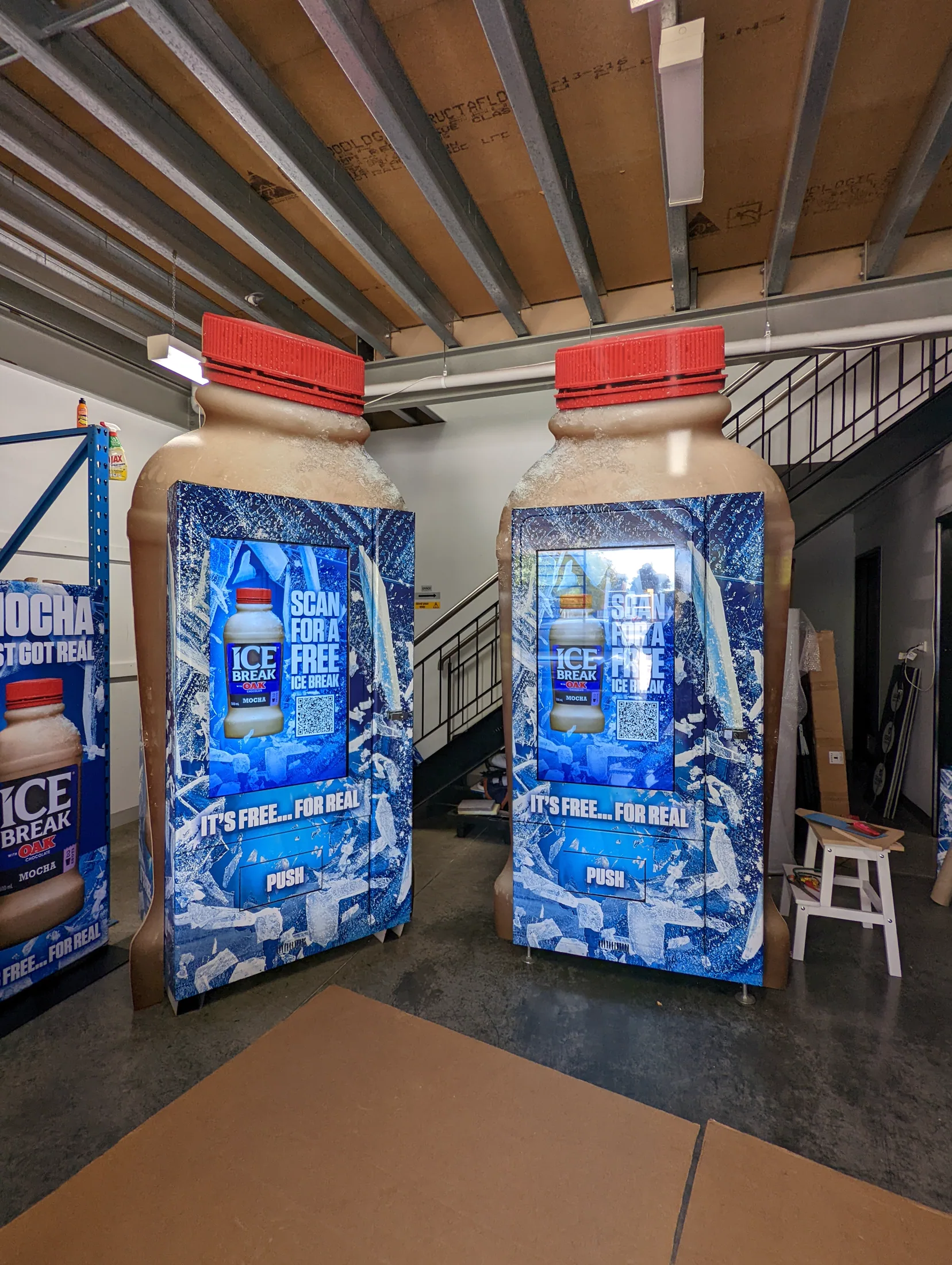Bottle-shaped ICE Break vending machines with full printed wraps