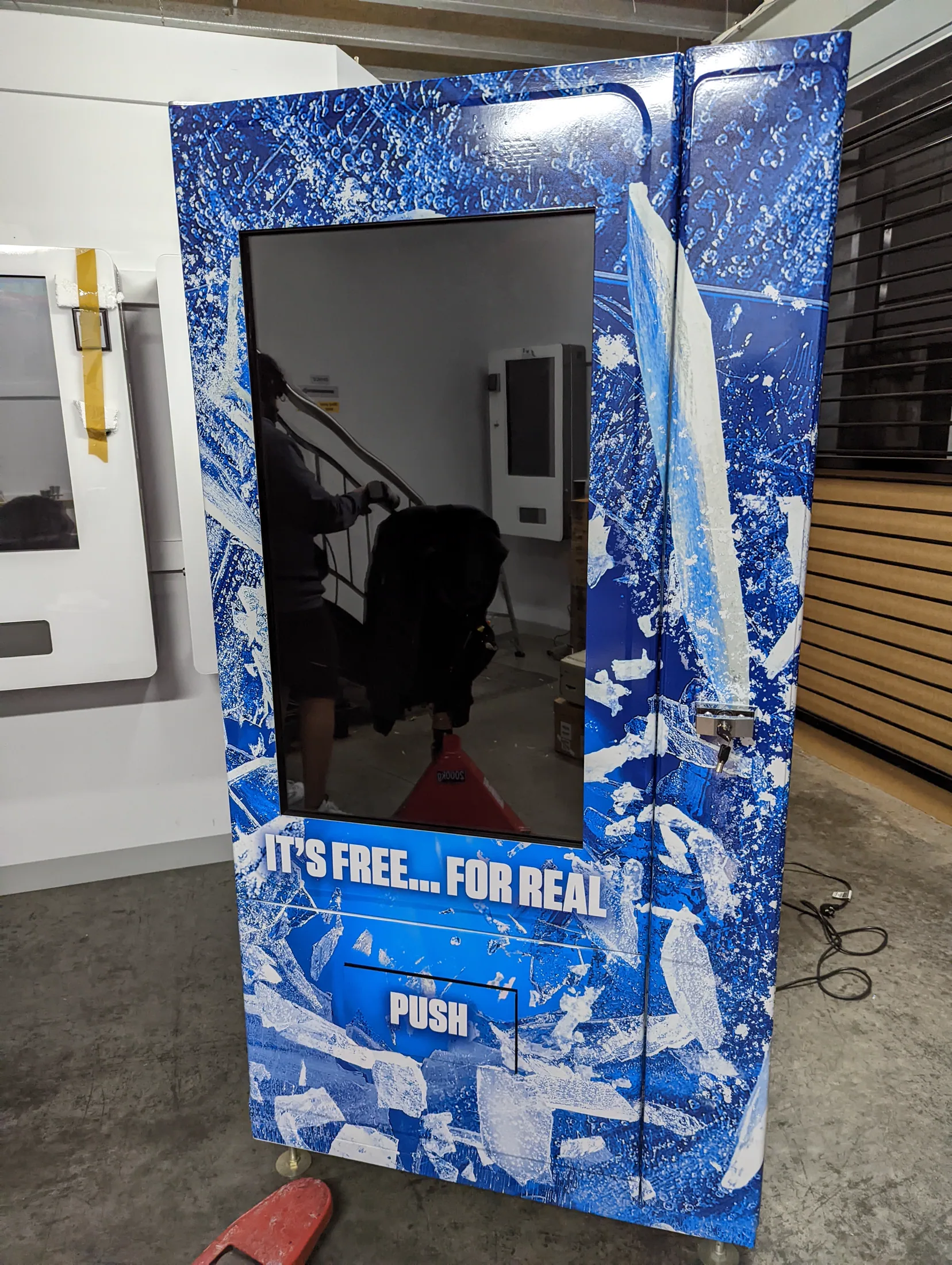 Wrapped ICE Break vending machine during production