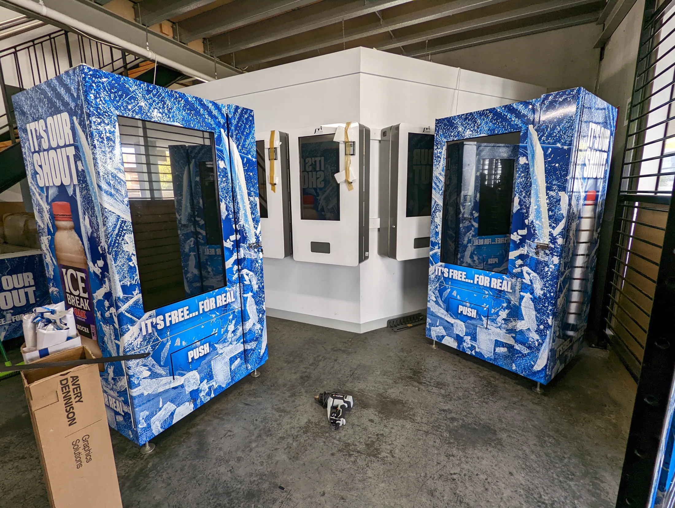 Pair of completed ICE Break vending machine wraps