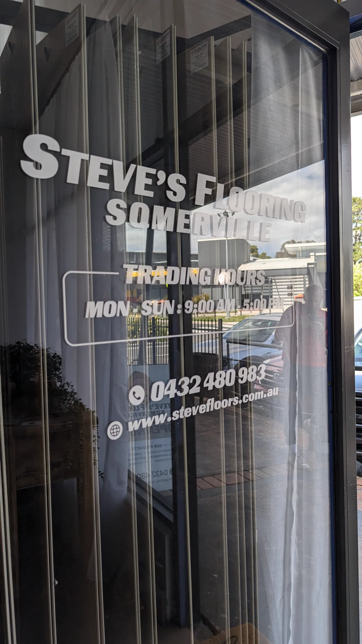 Steve's Flooring trading hours and window graphics