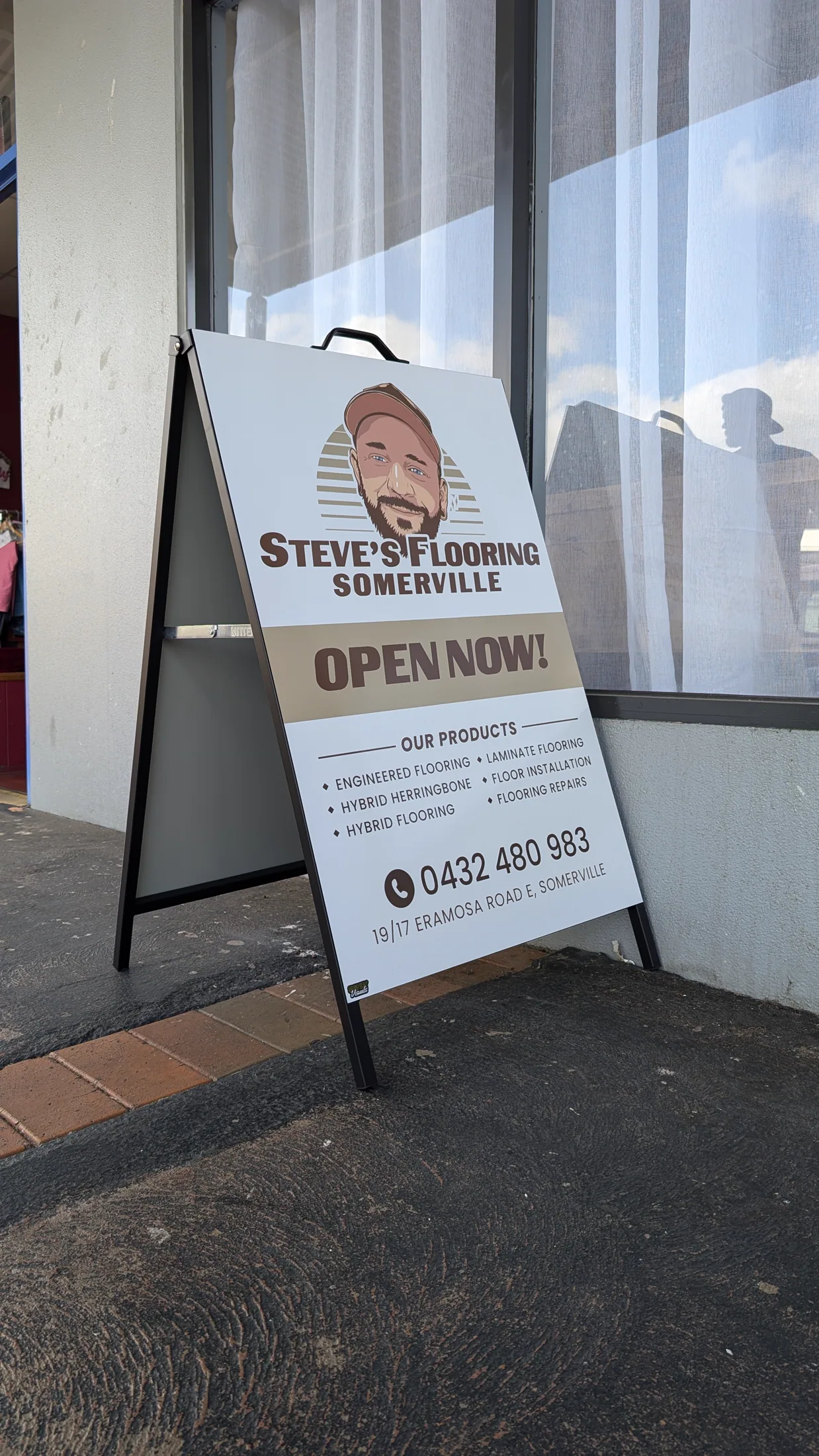 Steve's Flooring showroom window branding