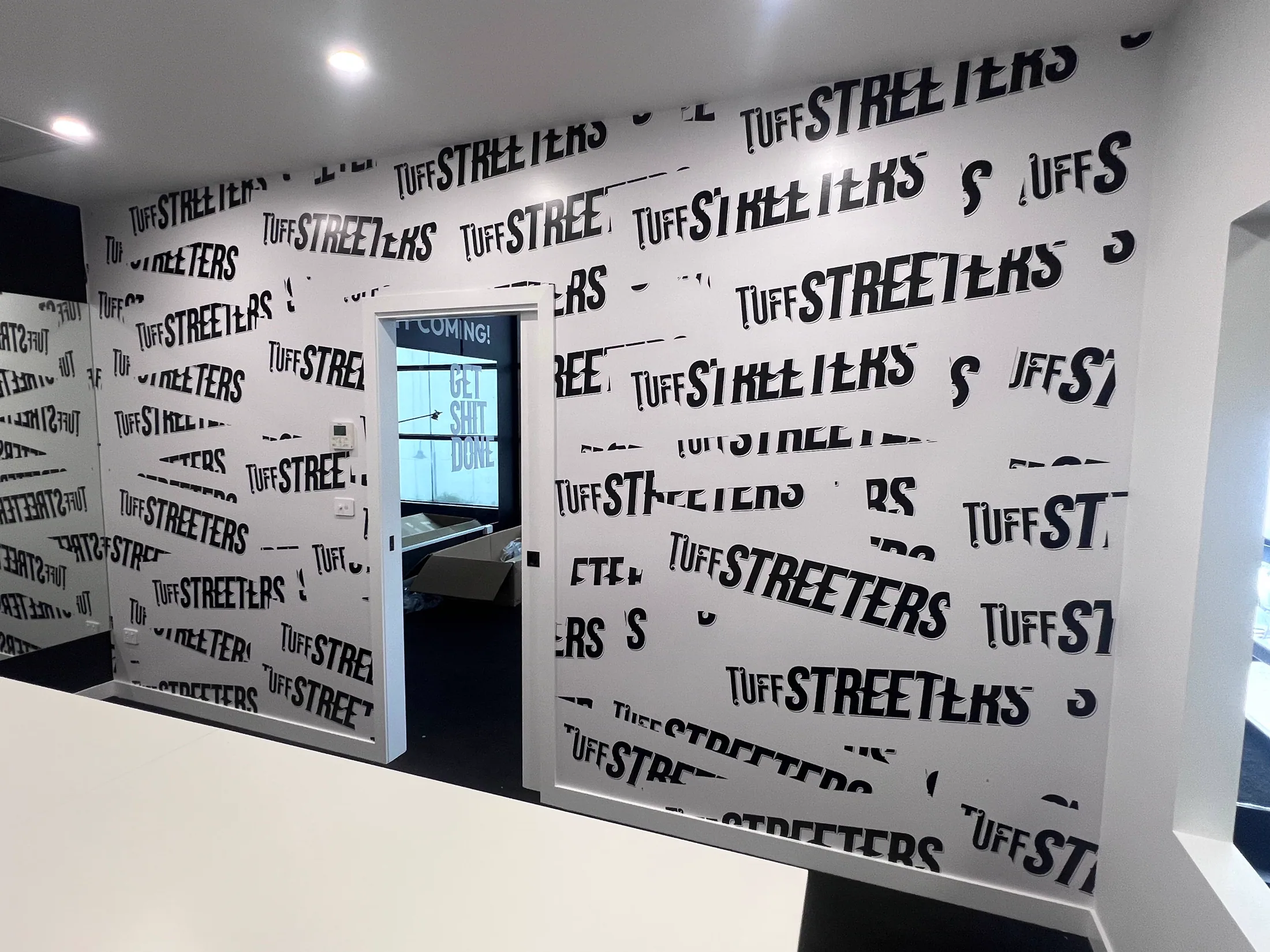 Tuff Streeters branded floor graphic