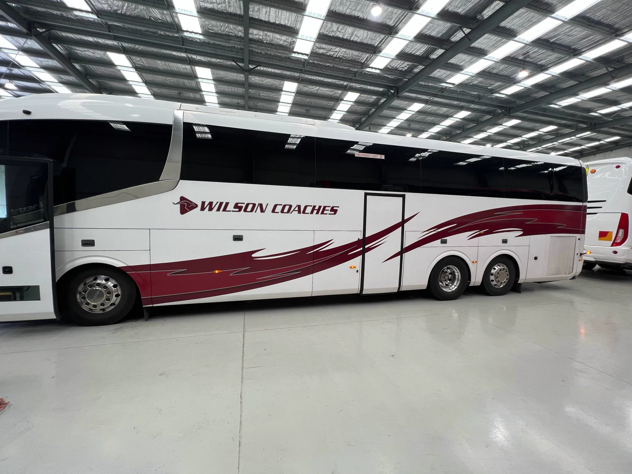 Wilson Coaches coach wrap front angle