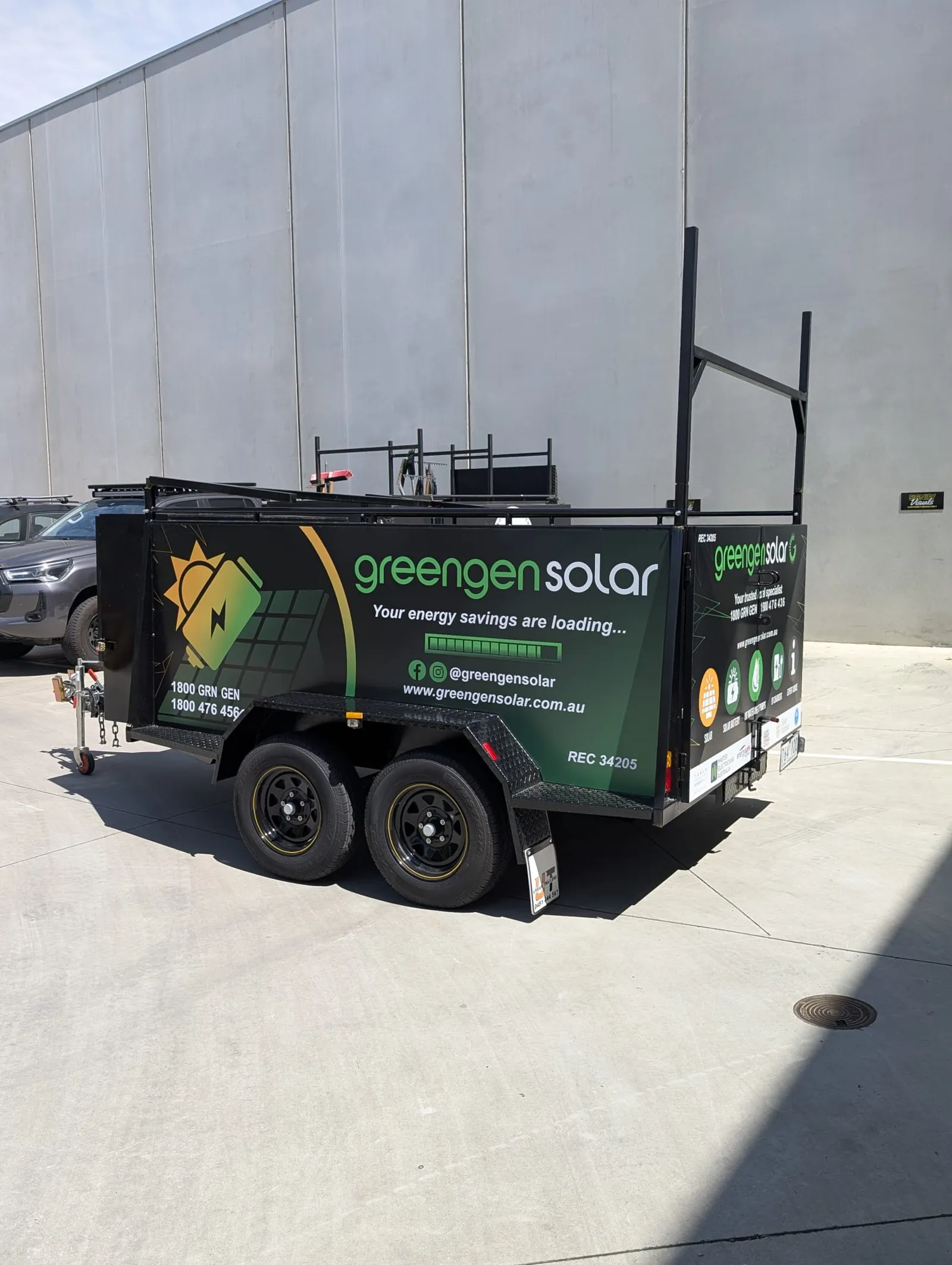 GreenGen Solar branded trailer signage